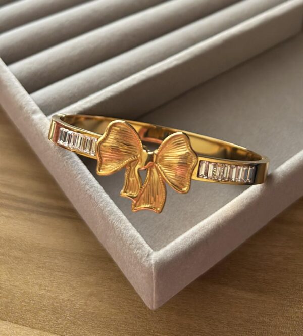 Gold-Plated Bow Bangle with Crystal Accents